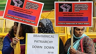 Protests erupt after two women make landmark step in Indian temple
