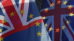 Union flags incorporating the EU stars seen outside the UK parliament.