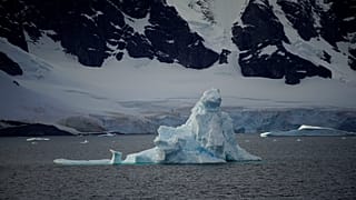 An iceberg floats near Orne Harbour, Antarctica