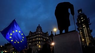 EU flag next to the statue of Winston Churchill outside Parliament