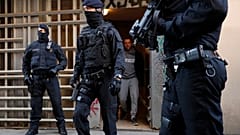 Catalan police arrest over 17 people during anti-terrorist raid in Barcelona and nearby town