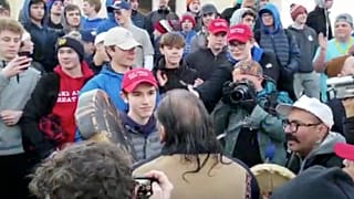 Nick Sandmann faces off with Nathan Phillips