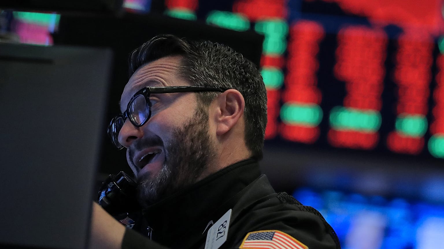 A trader works on the floor of the NYSE in New York