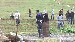 Palestinian protesters and Israeli troops clash in West Bank