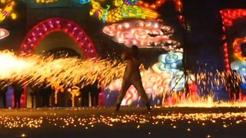Chinese revellers welcome Spring Festival with traditional charcoal-spinning