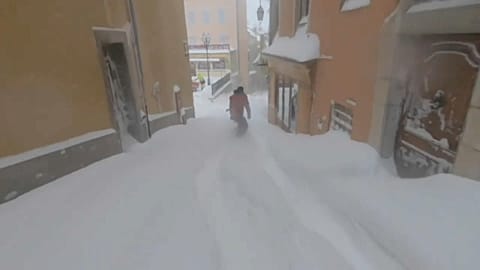 Young snowboarders show off their skills on French streets