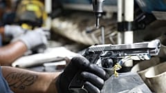 A file photo of a handgun on a production line