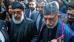 حامد کرزای و رئیس دفتر سیاسی طالبان در نشست صلح مسکو