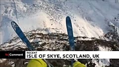 Daredevil base jumper performs outrageous leaps on Scottish mountains