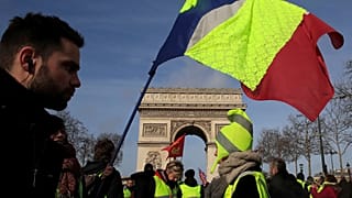Protesters wearing yellow vests take part in a demonstration Feb 2019