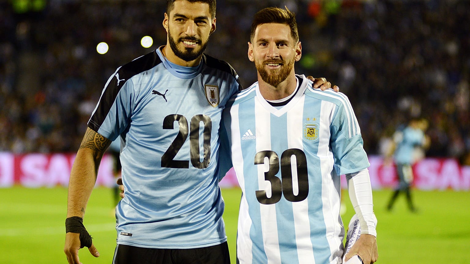 Argentina's Lionel Messi and Uruguay's Luis Suarez 