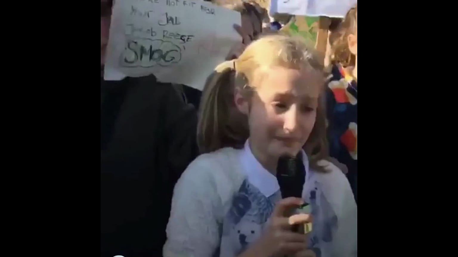 A tearful Iris, 11, making a climate plea in Cornwall.