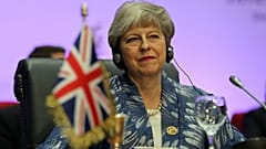 Theresa May goes from Dancing Queen to pool shark with Italy's Conte