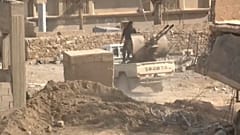 من المعارك في قرية الباغوز