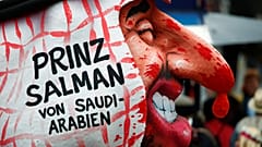 شاهد: كرنفال ألماني يسخر من منشار بن سلمان وأنف تيريزا ماي 