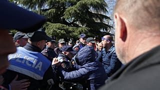 Albanian riot police clash with protesters calling for early elections
