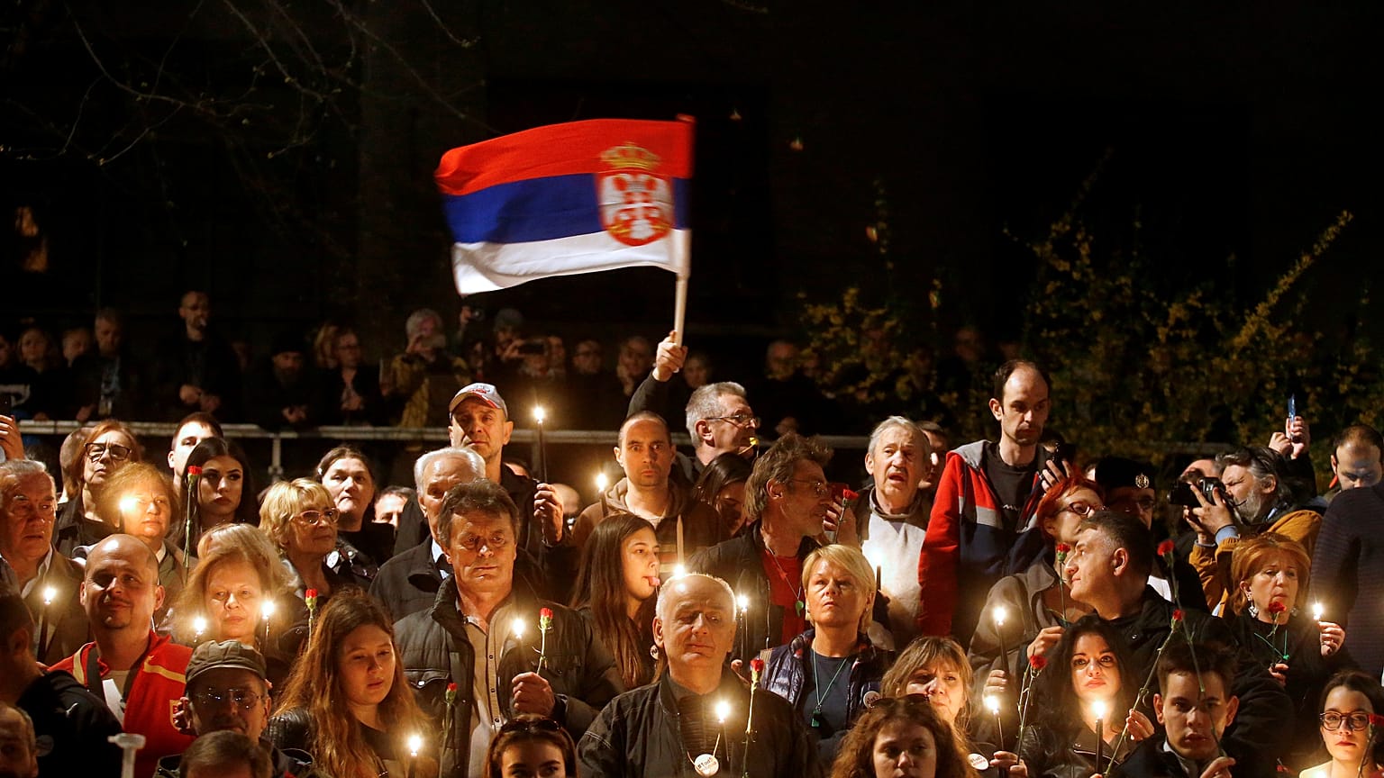 Demonstrators attend a protest against President Aleksandar Vucic 