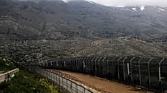 FILE PHOTO: Fences are seen on the ceasefire line between Israel and Syria 