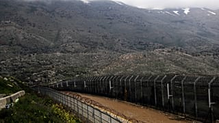 FILE PHOTO: Fences are seen on the ceasefire line between Israel and Syria