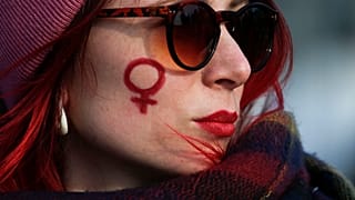 A participant at a feminist rally in Saint Petersburg, Russia