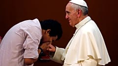The reason why the pope refused that people kiss his hand