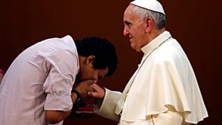The reason why the pope refused that people kiss his hand