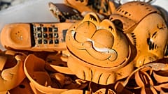 Locals solve mystery of Garfield phones washing up on French beach for 30 years