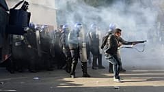 Algeria: Police 'fire rubber bullets and tear gas at protesters' in biggest demonstration yet