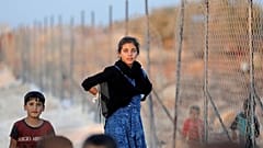لاجئة سورية في مخيم أطمة