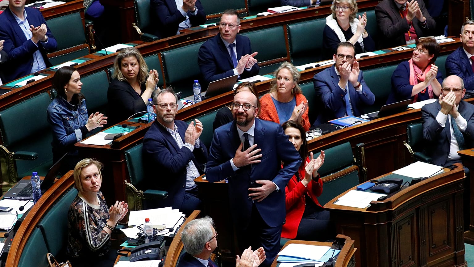 Belgium's Prime Minister Charles Michel reacts after delivering a speech 