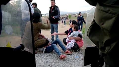 Greek police fire tear gas at migrants as border convoy grows