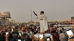 Female protester in Khartoum, 8 April 2019