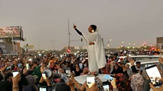 Female protester in Khartoum, 8 April 2019