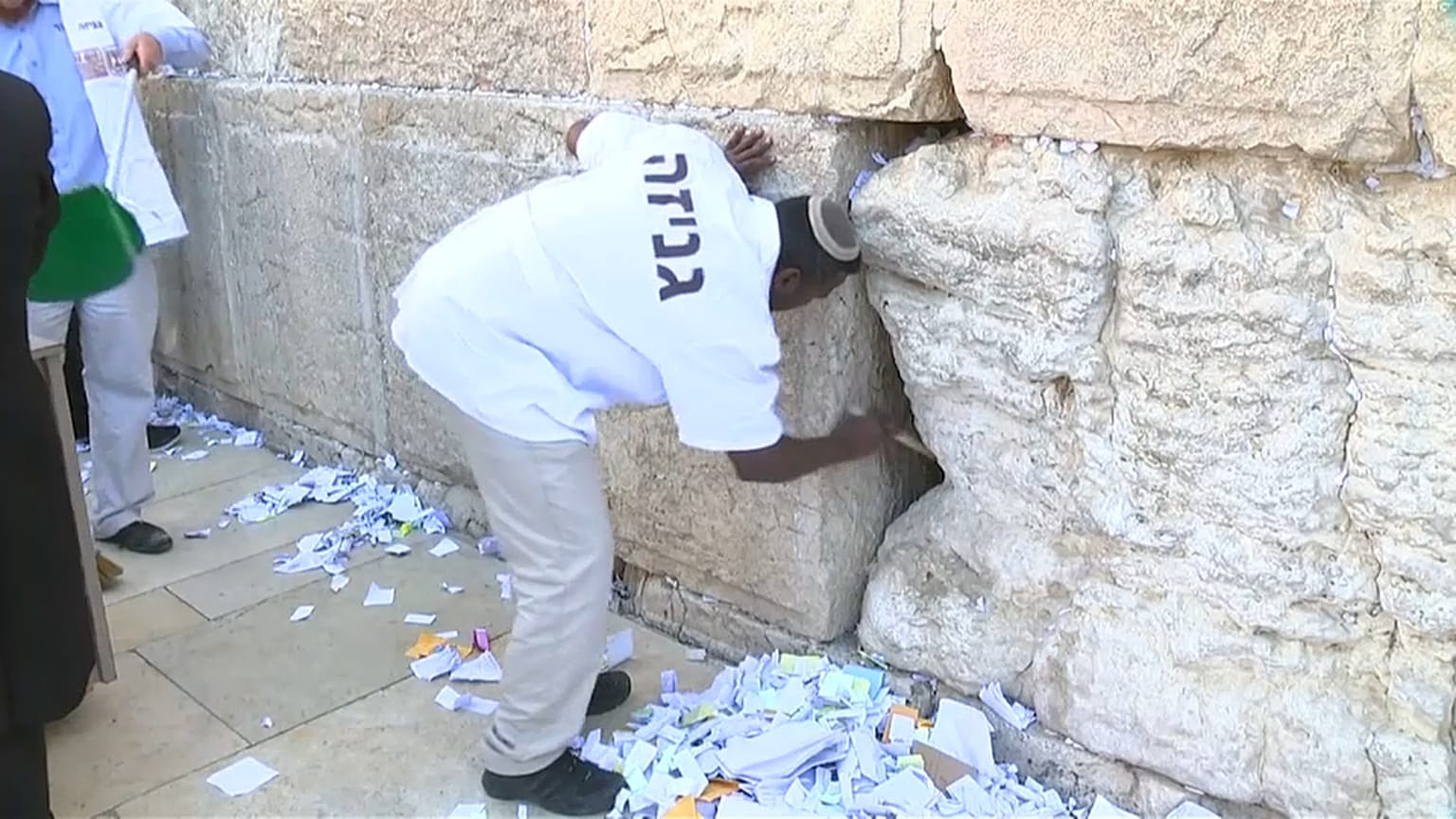 After removal, the notes are buried on the Mount of Olives