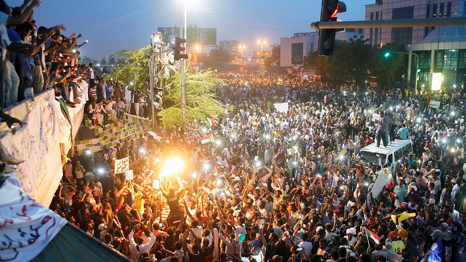 Protestors call for the resignation of Omar al-Bashir