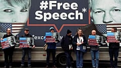 Assange 's supporters in front the Ecuador embassy of London.