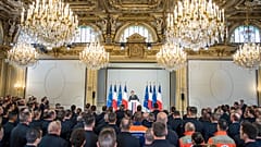 Firefighters honoured at Elysee Palace
