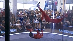Competitors skydive in the wind tunnel