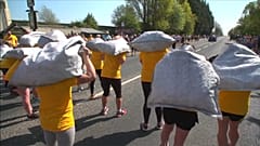 The women carried 20 kilograms of coal while the men carried 50 kilos.