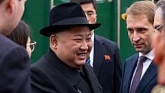 Kim Jong Un greeted with bread and flowers as he arrives in Russia for Putin meeting