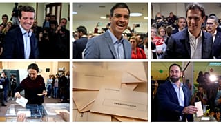 A woman casts her vote during Spain's general election in Madrid, Spain