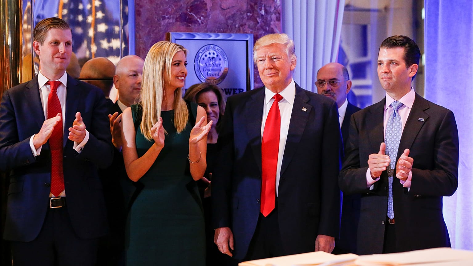 Donald Trump with son Eric (L), daughter Ivanka and son Donald Jr (R), 2017