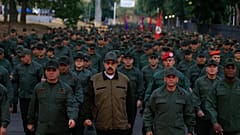 Defiant Maduro tweets pictures of himself with Venezuela's army