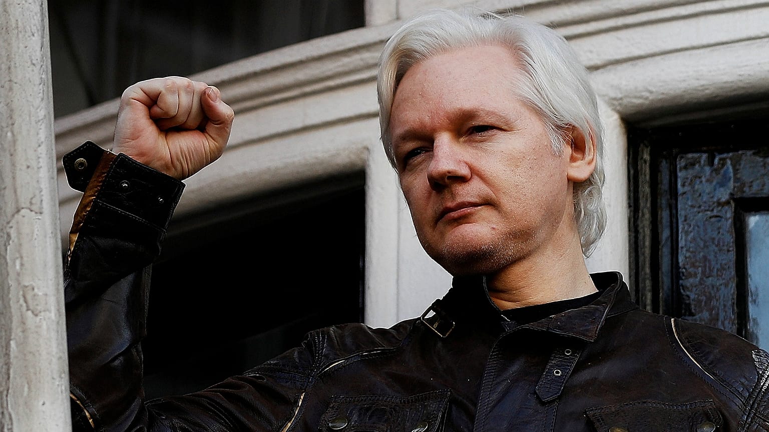 Julian Assange refuses to surrender to US extradition at court hearing in London