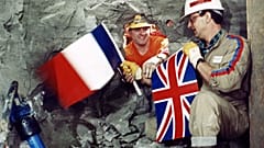 FILE PHOTO: Tunnel workers Philippe Cozette and Graham Fagg, 1990