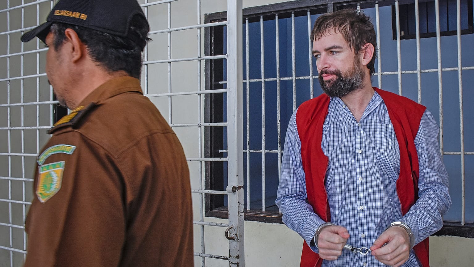 Dorfin, walks before his trial in Lombok, Indonesia