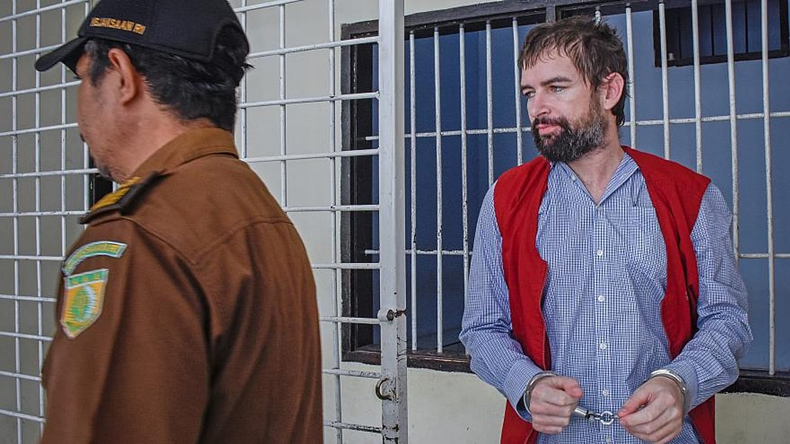 Dorfin, walks before his trial in Lombok, Indonesia