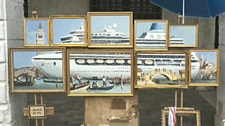 Oil paintings create an image of a giant cruise ship in the city's canal 
