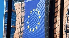 EU Commission HQ is reflected in the windows of the EU Council building 