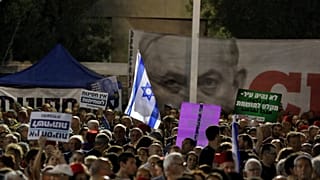 Thousands of Israelis protest legislative changes to grant PM immunity and limit Supreme Court